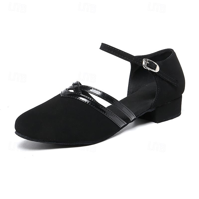 Elegant black women's dance shoes with a round toe & secure ankle strap. Designed for graceful movement.