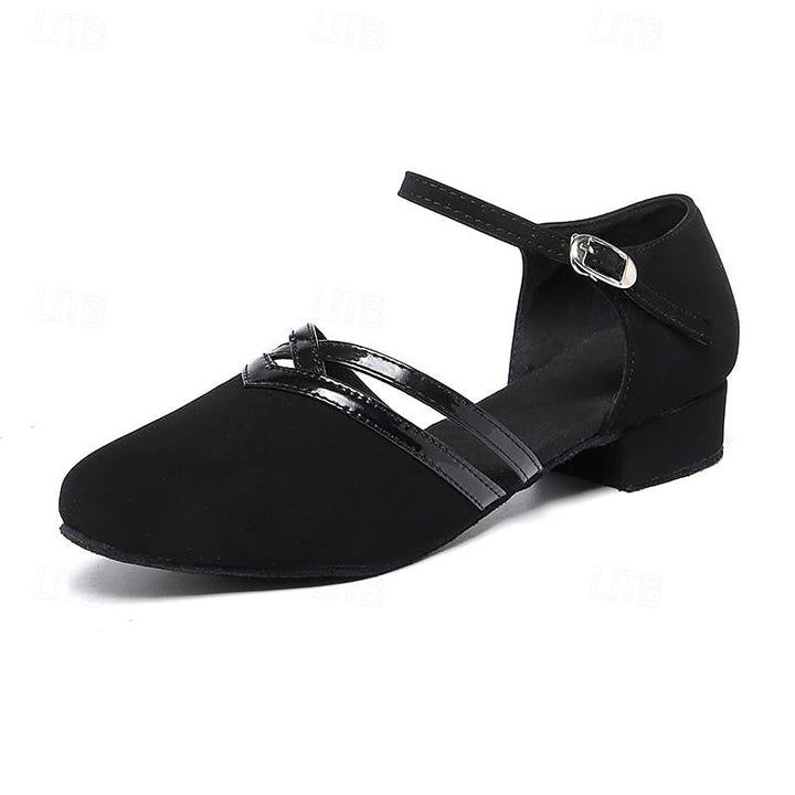Elegant black women's dance shoes with a round toe & secure ankle strap. Designed for graceful movement.