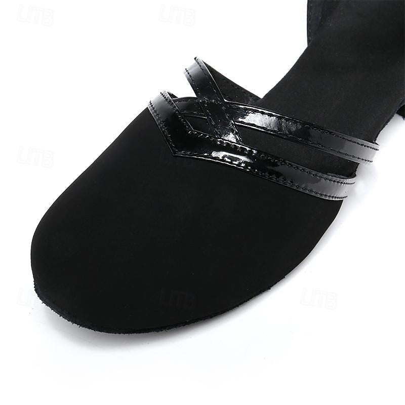 Performance women's dance shoes in black with a comfortable ankle strap, round toe, & stable heel for smooth steps.