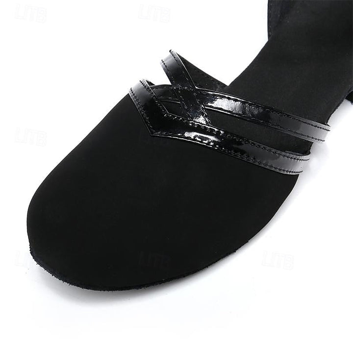 Performance women's dance shoes in black with a comfortable ankle strap, round toe, & stable heel for smooth steps.