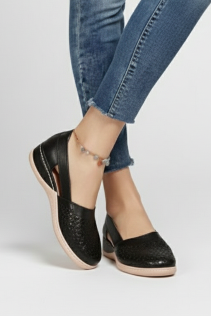 White women's everyday cutout shoes, perfect for casual wear. Comfortable walking footwear with unique design.