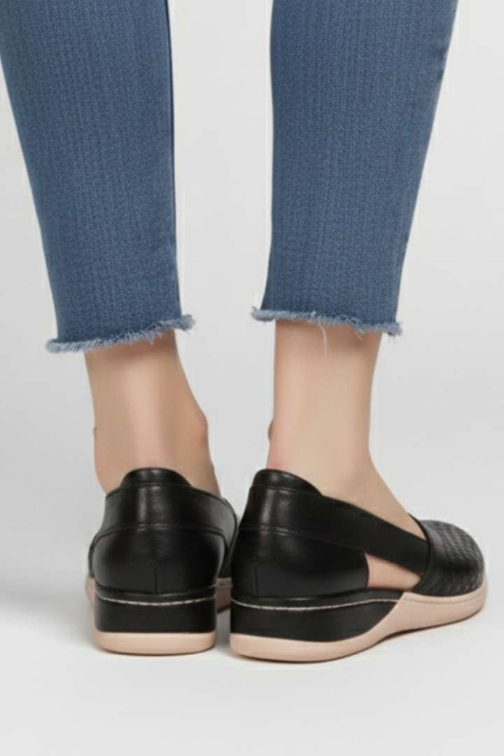Brown women's fashion cutout shoes. Comfortable and stylish everyday casual footwear, ideal for walking.