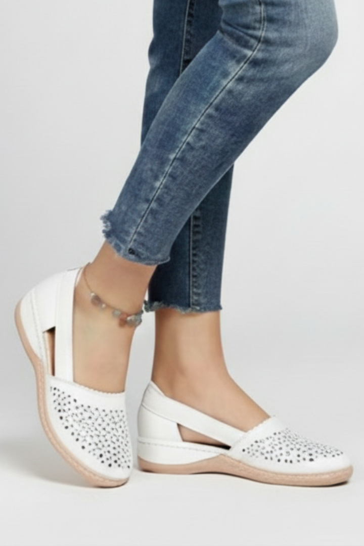 Green women's casual cutout shoes, designed for comfort. Everyday walking footwear with a fashionable twist.