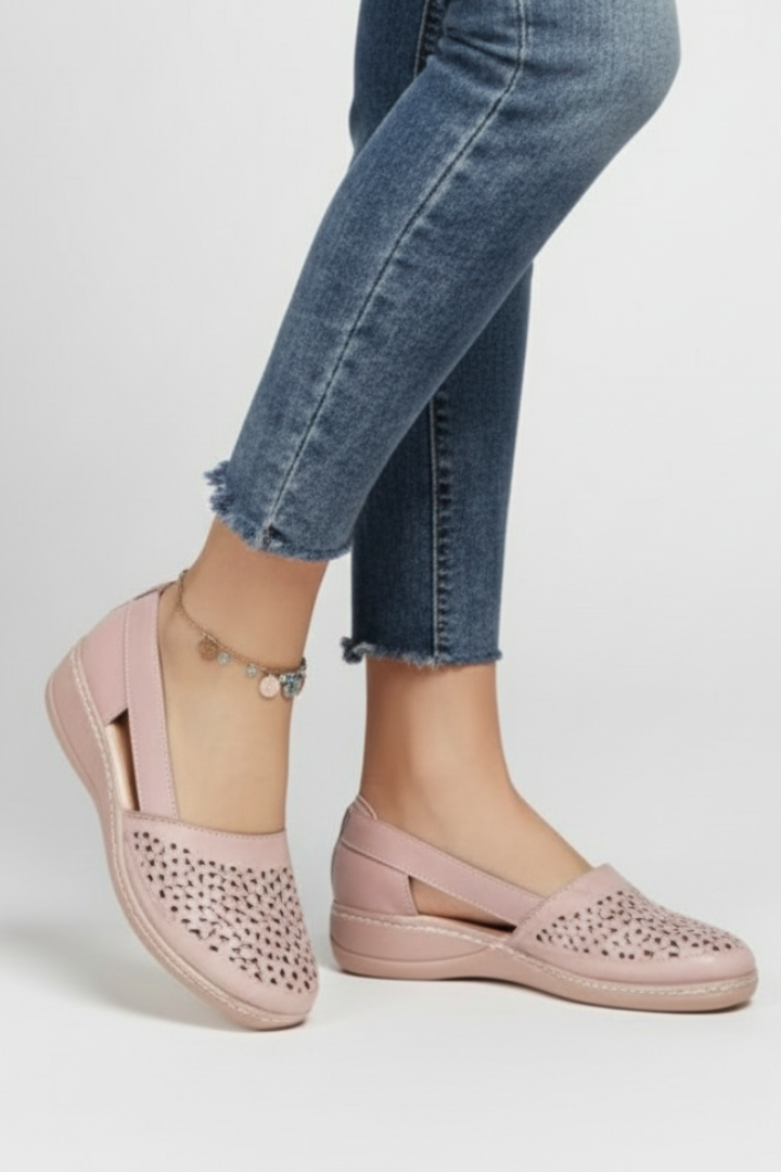 Comfortable women's everyday walking shoes with elegant cutouts. Perfect all-day casual footwear in various colors.