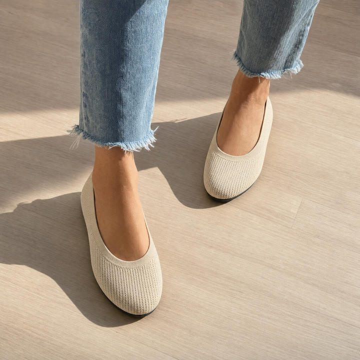 Side profile of women's orthopedic slip-on shoes. Designed for casual walking, comfort, and posture support.