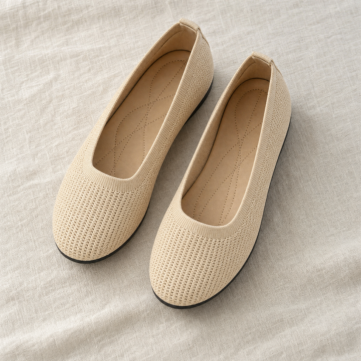 Top view: Women's comfortable orthopedic slip-on shoes in black, perfect for daily walking and arch support.