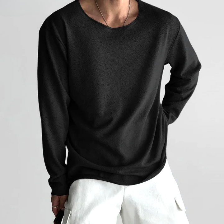 Casual unisex long-sleeve tee in a soft, breathable fabric. Perfect minimalist top for relaxed everyday wear & comfort.