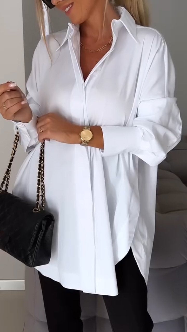 Relaxed fit white oversized blouse for women, comfortable collared top, perfect for office or casual.