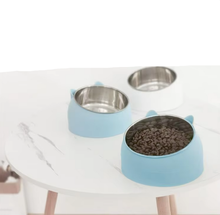 Angled pet feeding dish in blue, a slow feeder for cats, supporting pet health and posture.