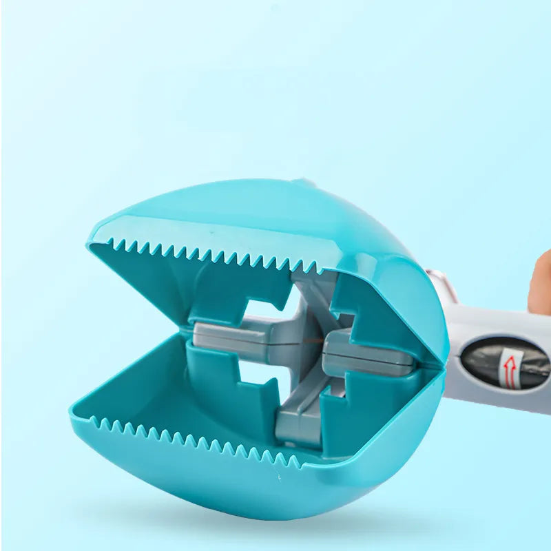 Durable blue dog waste picker, a key pet supply for maintaining cleanliness in outdoor spaces.