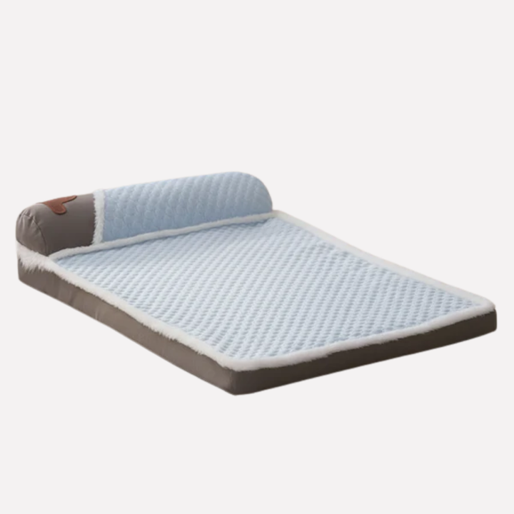 Blue self-cooling gel mat providing comfort for a dog in summer, washable pet supply accessory.