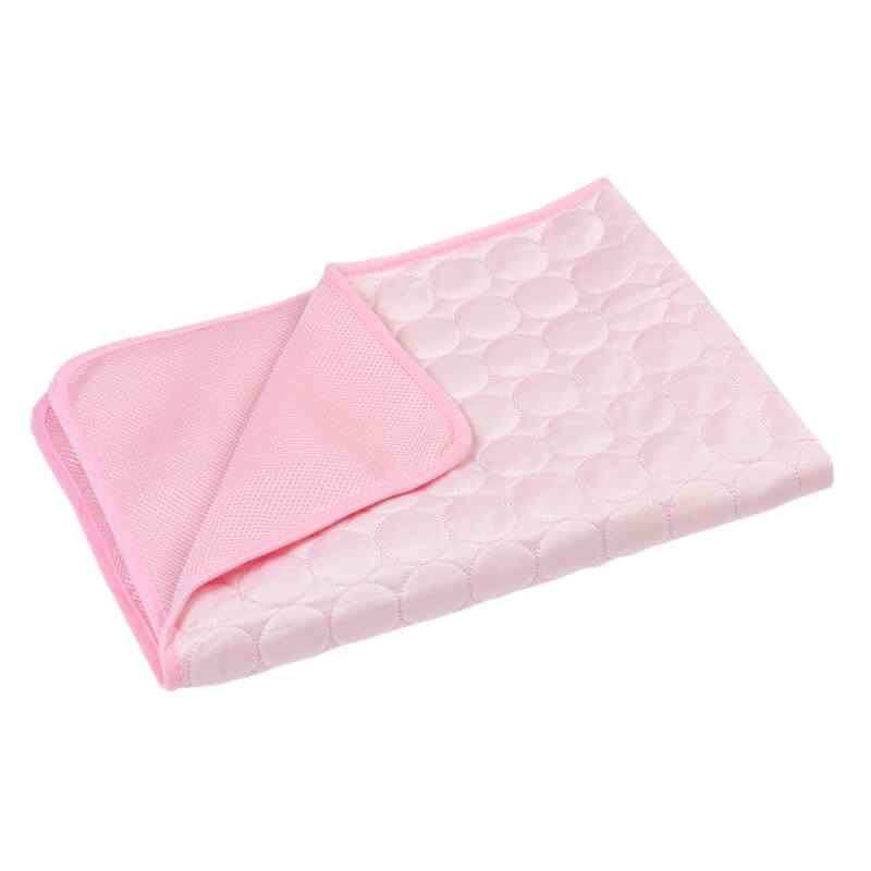 Textured surface of a self-cooling pet mat for enhanced animal accessories and comfort