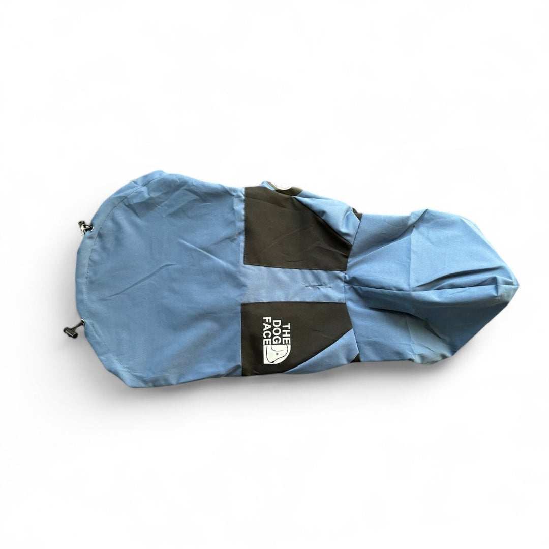 Adjustable blue waterproof dog jacket with hood and reflective trim for pet safety.