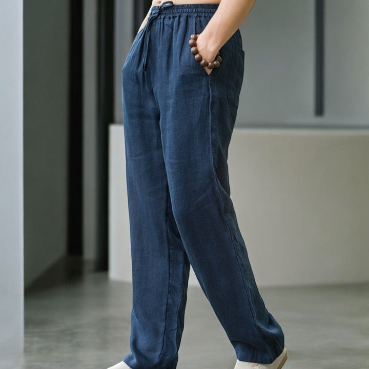 White men's relaxed fit summer pants, breathable & comfortable for hot weather lounging.