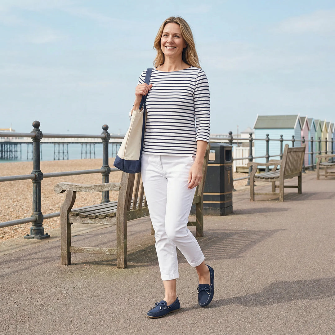 Comfortable navy blue extra wide slip-on loafers for women, perfect for dressy or casual outfits.