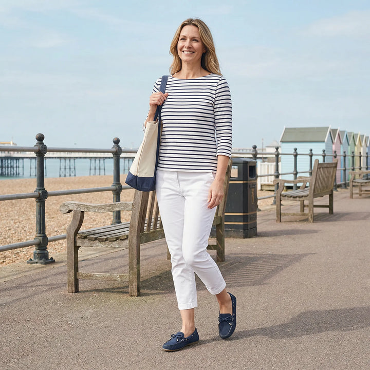Comfortable navy blue extra wide slip-on loafers for women, perfect for dressy or casual outfits.