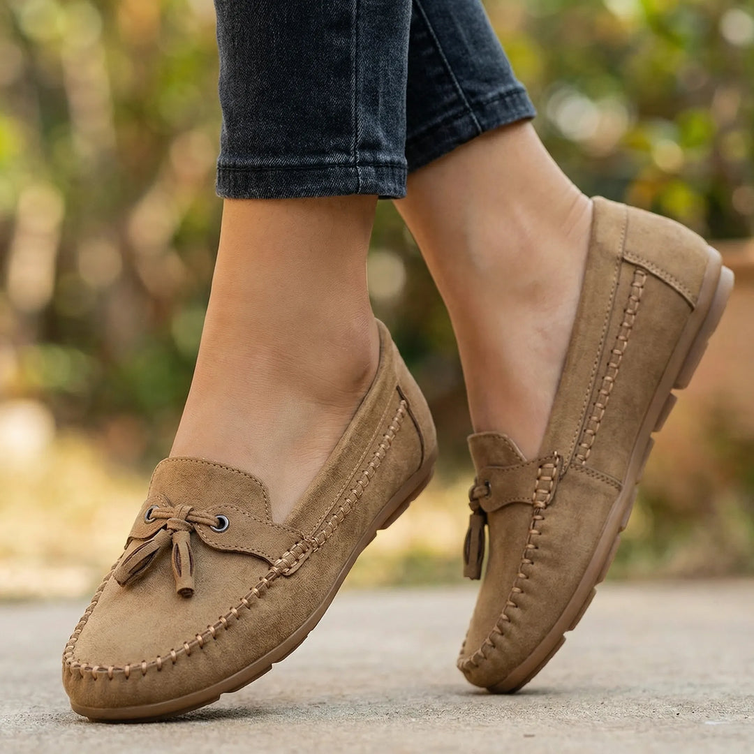 Comfortable stone brown extra wide slip-on loafers for women, ideal for casual and everyday wear.