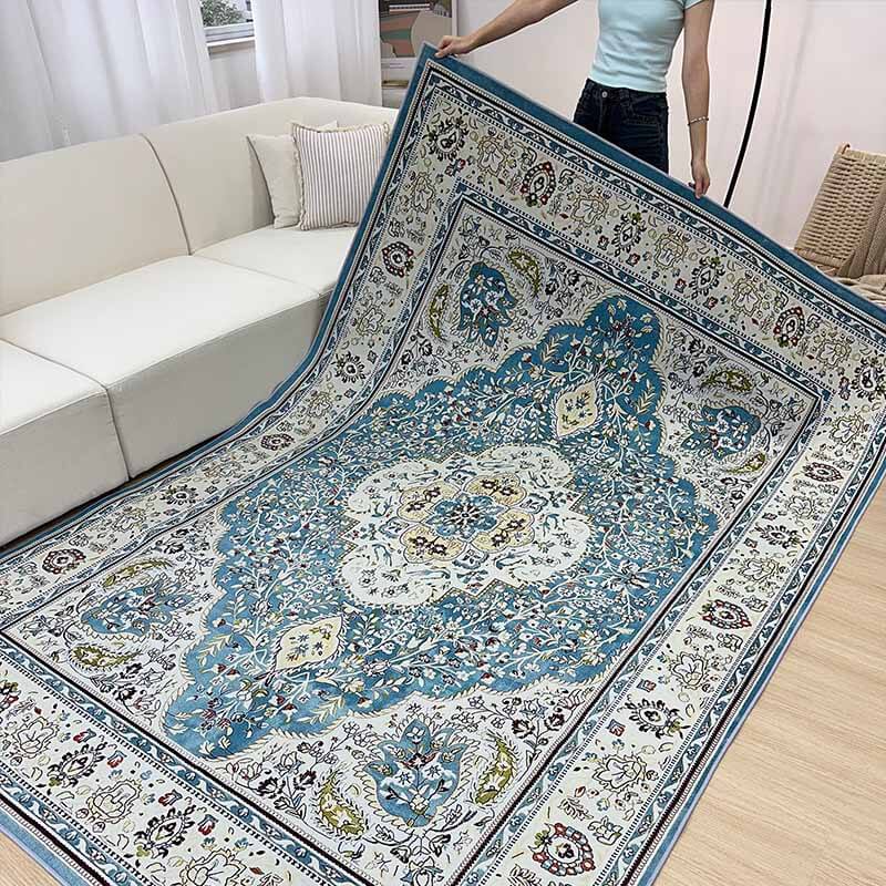 Full view of large bohemian floral area rug in a modern living room setting, adding warmth & style.