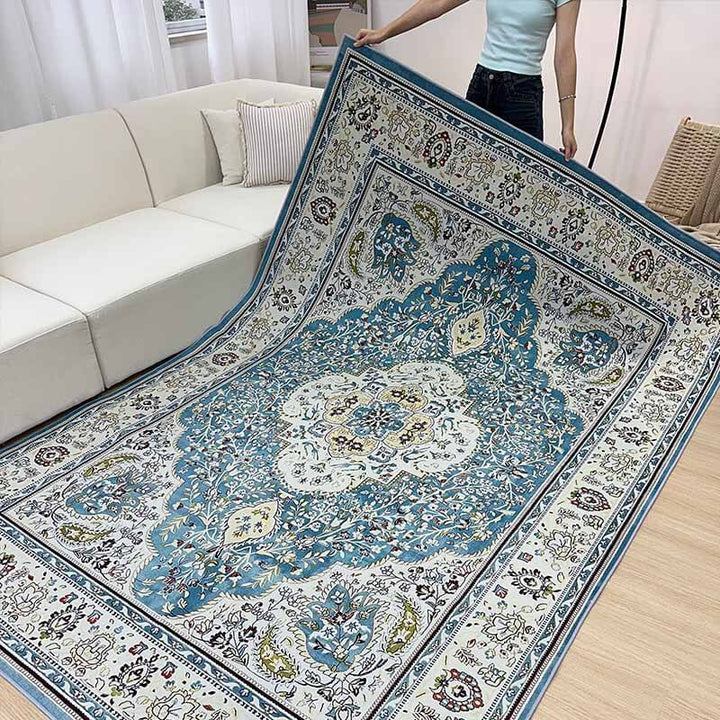 Full view of large bohemian floral area rug in a modern living room setting, adding warmth & style.