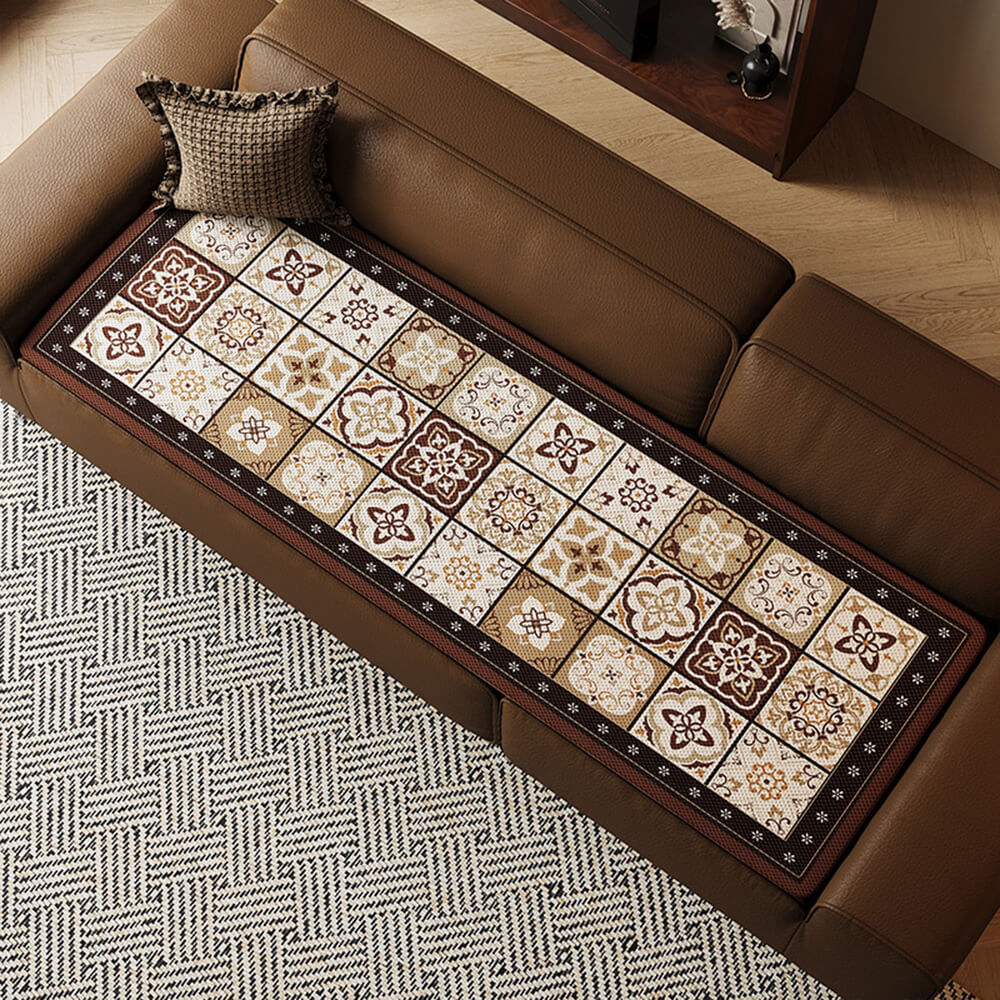 Bohemian ice silk sofa cover with ornate patterns, breathable and non-slip for living room decor.