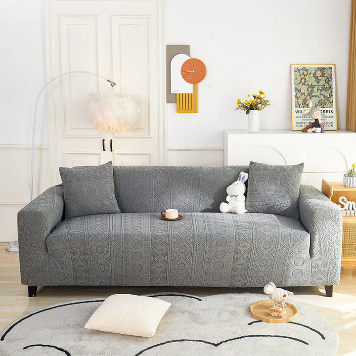 Bohemian pattern details on Jacquard Stretch Sofa Slipcover, cozy home feel