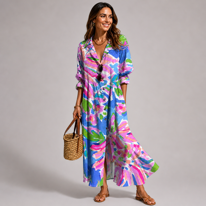 Flowing bohemian printed maxi dress for women, button-front design, great for beach vacations and casual wear.