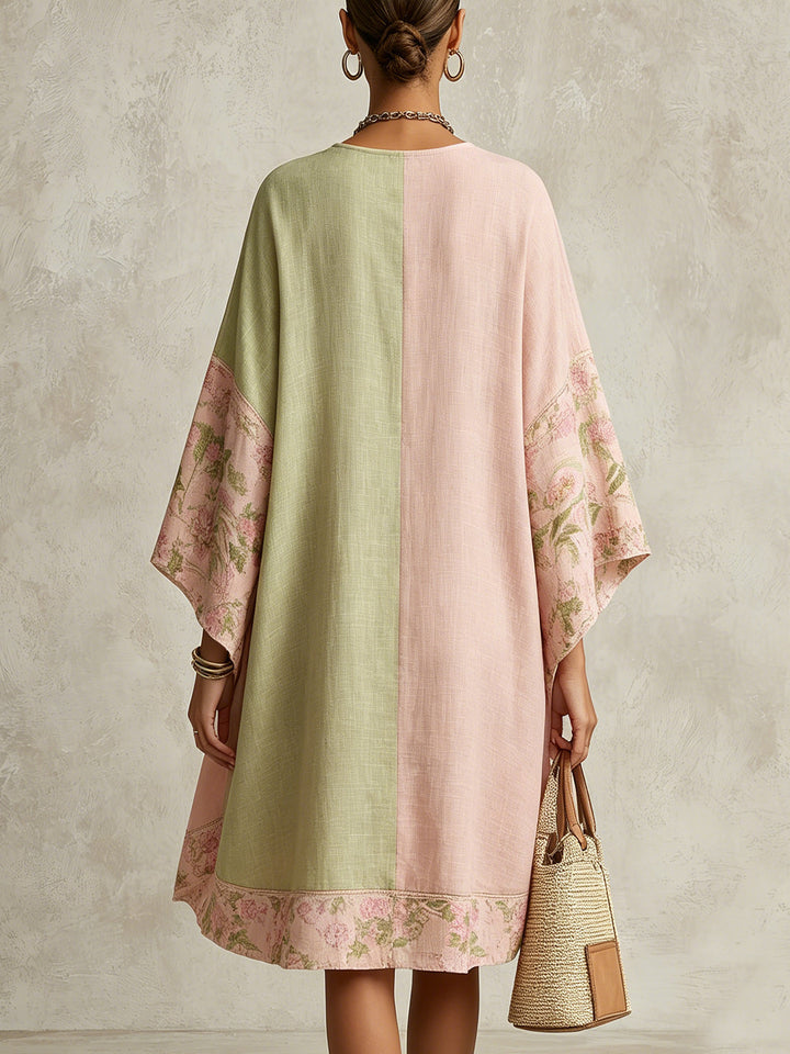 Women's bohemian flowing kaftan maxi dress featuring a V-neck and stylish kimono sleeves. Ideal for summer.