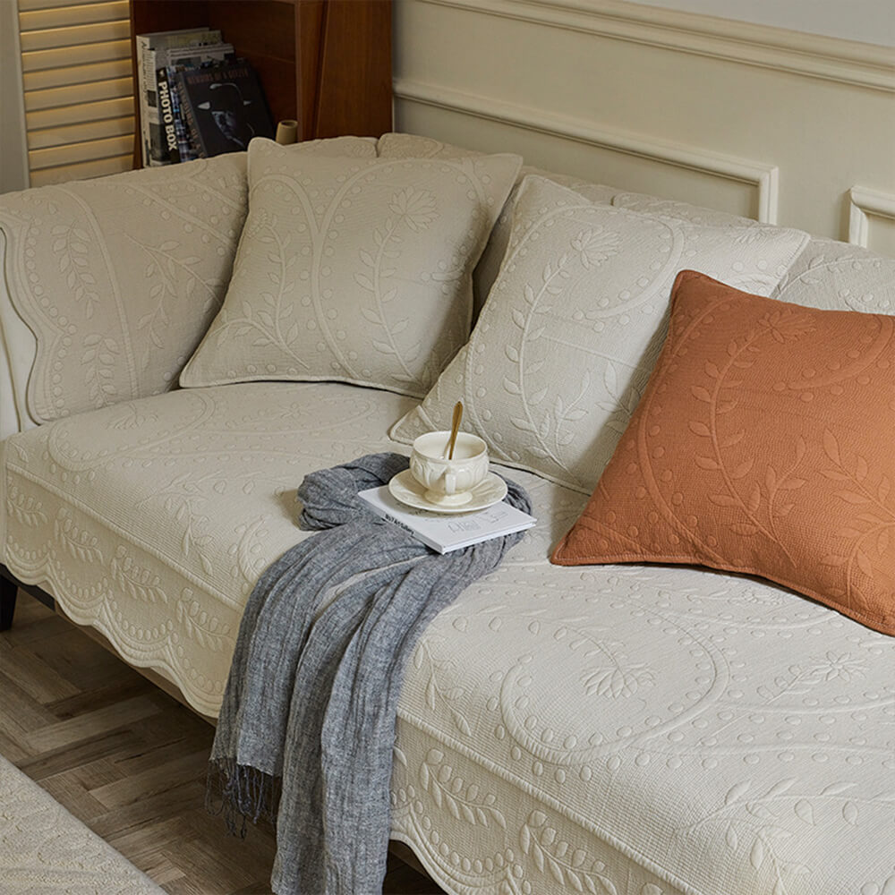 Boho cotton sofa slipcover with textured weave, perfect for farmhouse living rooms and pet-friendly homes.
