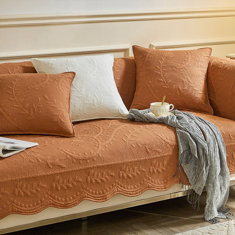 Textured boho sofa slipcover in natural cotton, ideal for updating living room decor or protecting furniture.