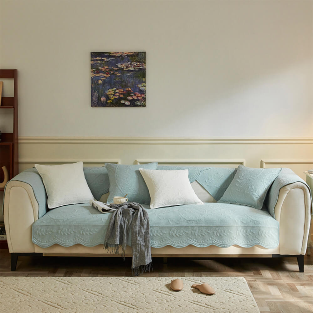 Pet-friendly boho cotton sofa slipcover, shown protecting furniture while adding a decorative touch.