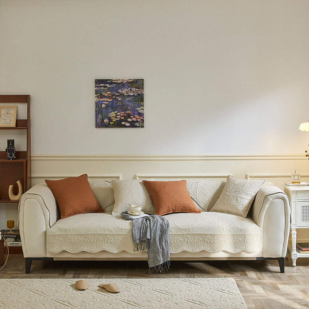 Washable cotton sofa slipcover with a textured boho design, perfect for easy care in busy homes.