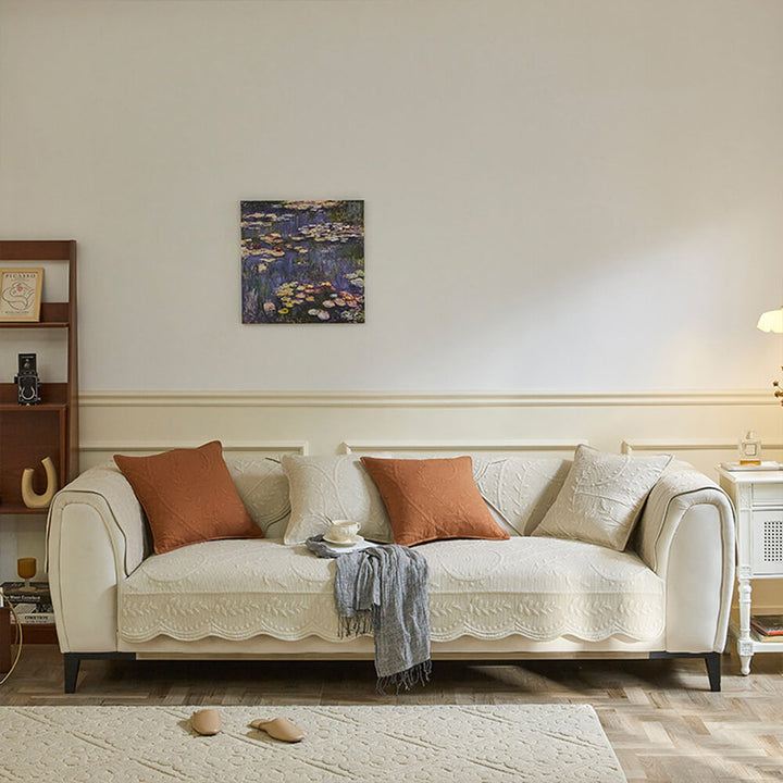 Washable cotton sofa slipcover with a textured boho design, perfect for easy care in busy homes.