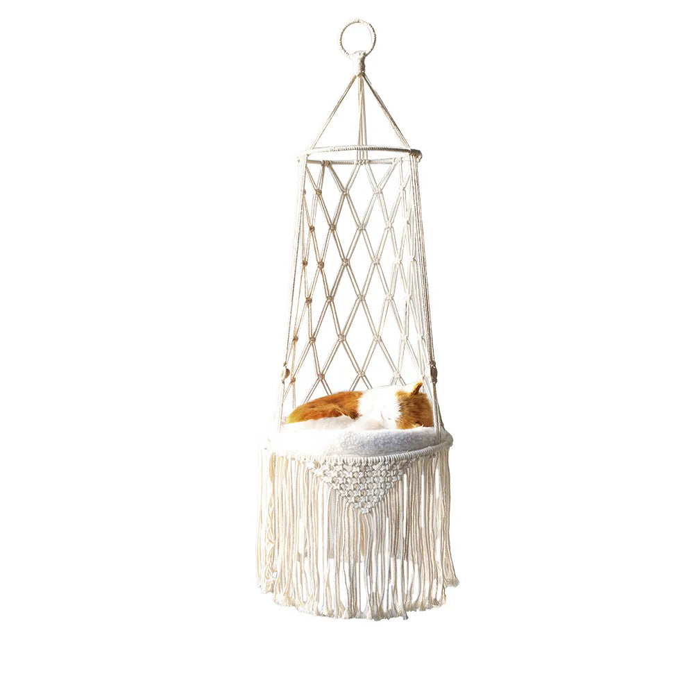 Close-up of a woven macrame cat bed, showing intricate details and a plush cushion