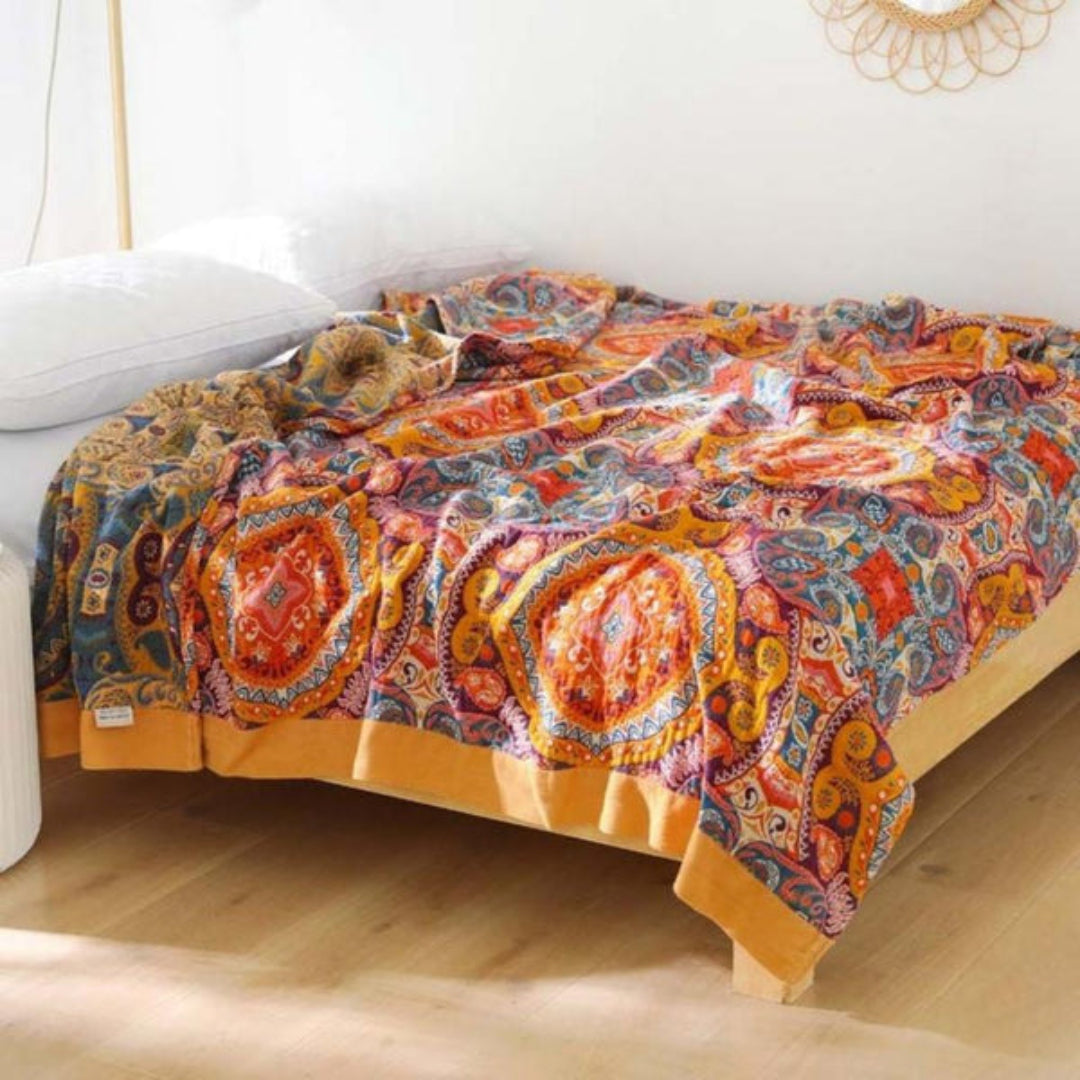 Boho reversible quilted blanket with a vibrant bohemian pattern, perfect for bedroom decor and all-season use