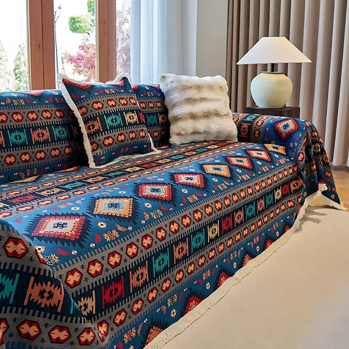 Full view of non-slip Bondi Breeze textured chenille sofa cover draping a living room couch