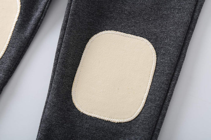 Details of the comfortable shorts from the boys' adventure dinosaur set, designed for movement.