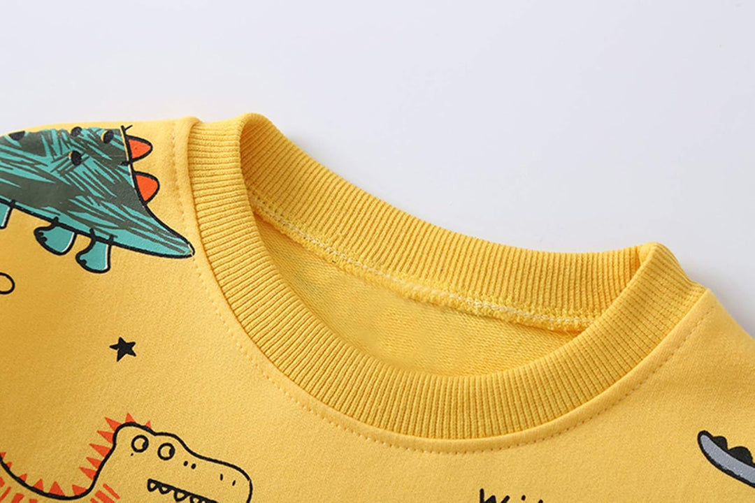 Comfy boys' casual wear: dinosaur-themed t-shirt and shorts set for toddlers' everyday adventures.
