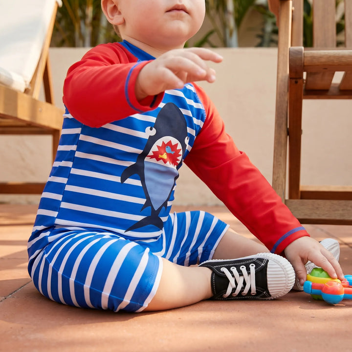 Boys' cartoon swimwear set with UPF 50+ rashguard & matching swim hat for toddler sun protection.
