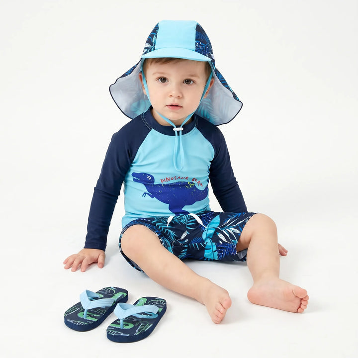Vibrant cartoon boys' swimwear set, UPF 50+ rashguard & hat. Quick-dry toddler swim outfit for sunny days.
