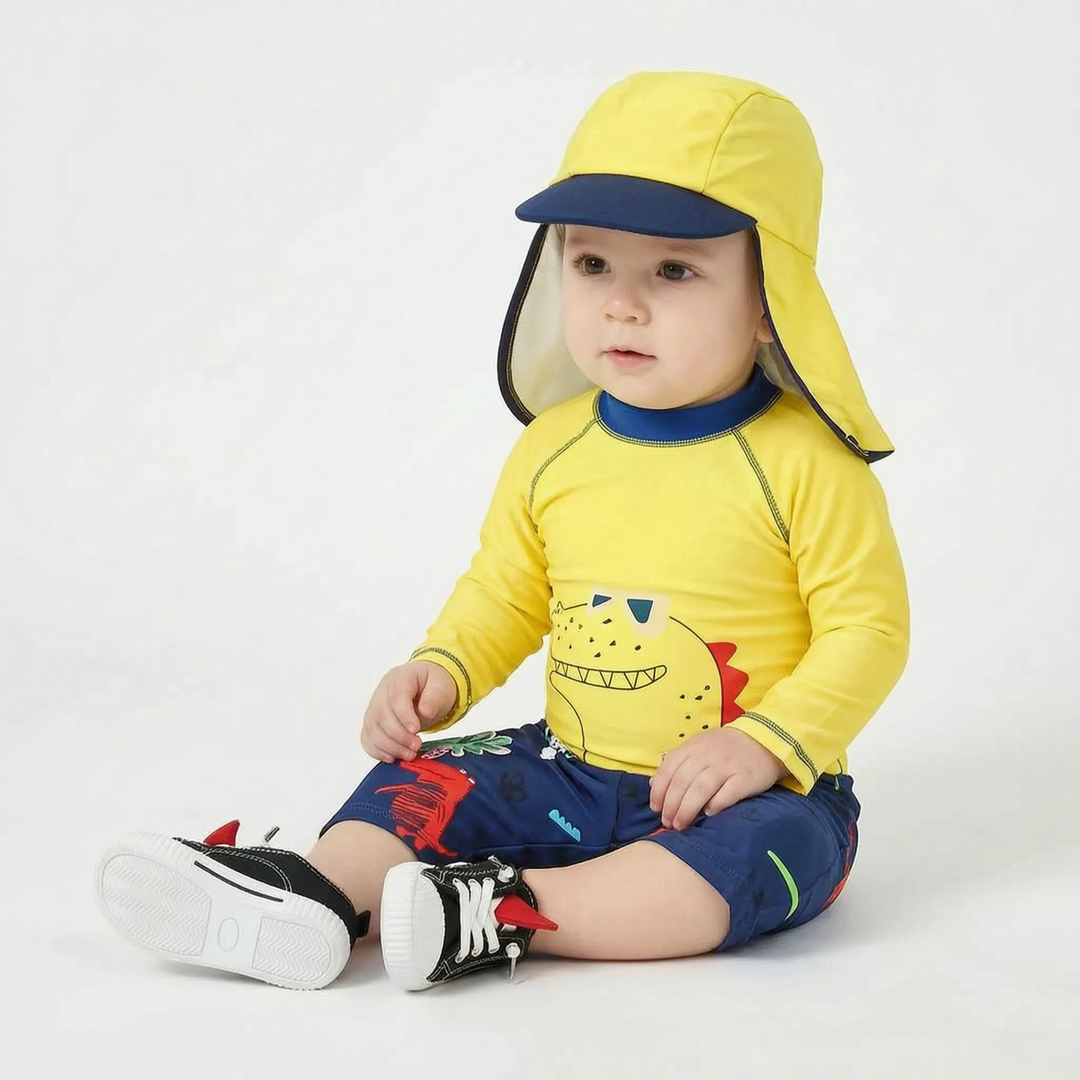 Toddler boys' UPF 50+ cartoon swimwear set with rashguard and sun protection hat. Great for kids' beach fun.