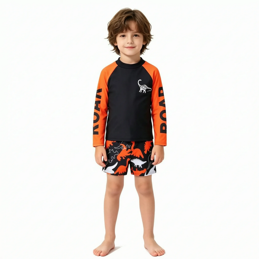 Sun protective boys' long sleeve dinosaur swimwear. Two-piece design ensures comfort & style for summer.