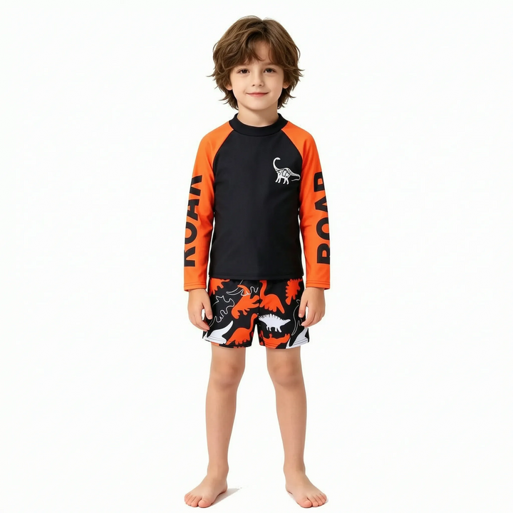 Sun protective boys' long sleeve dinosaur swimwear. Two-piece design ensures comfort & style for summer.