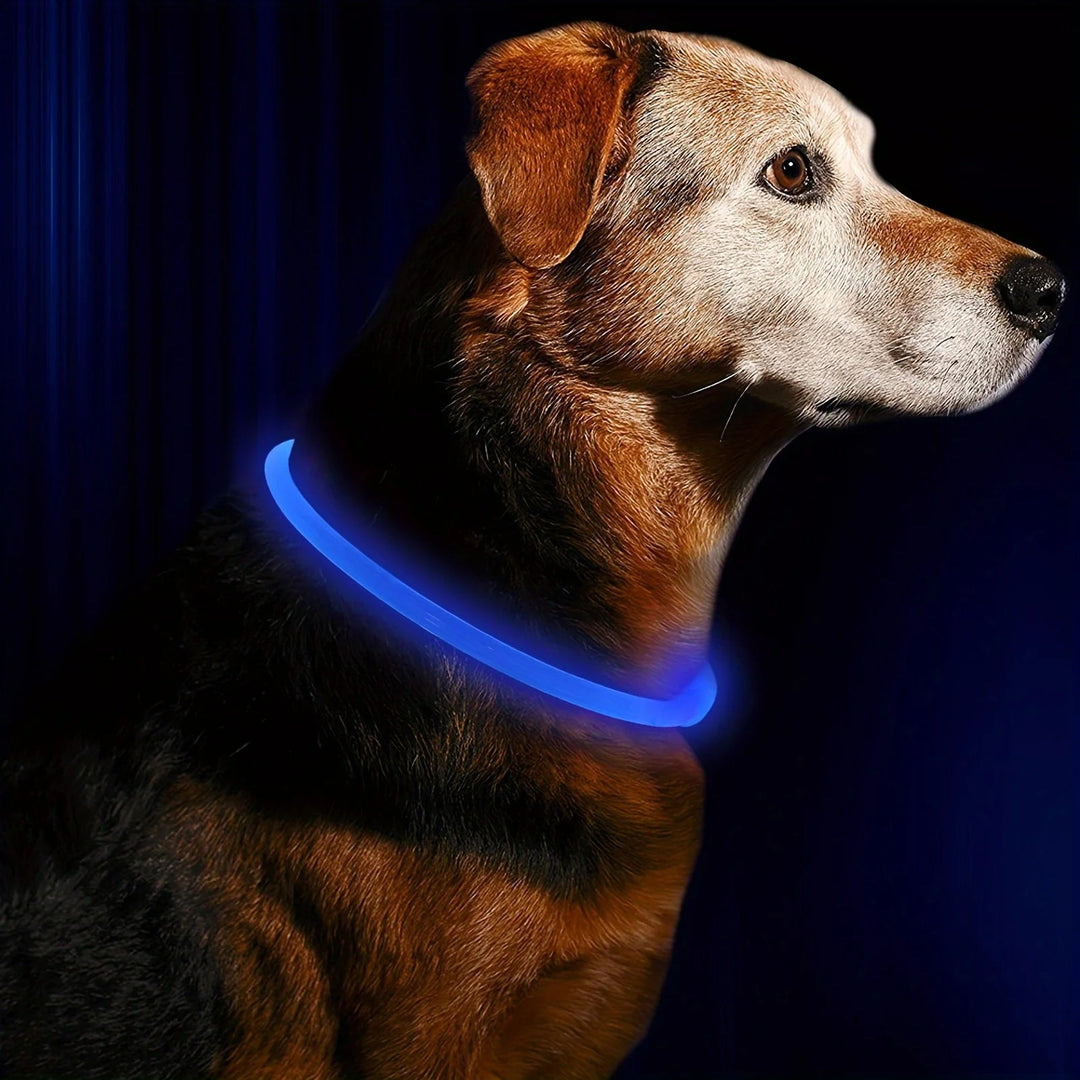 Adjustable pink LED dog collar, weatherproof, providing high visibility for nighttime pet safety