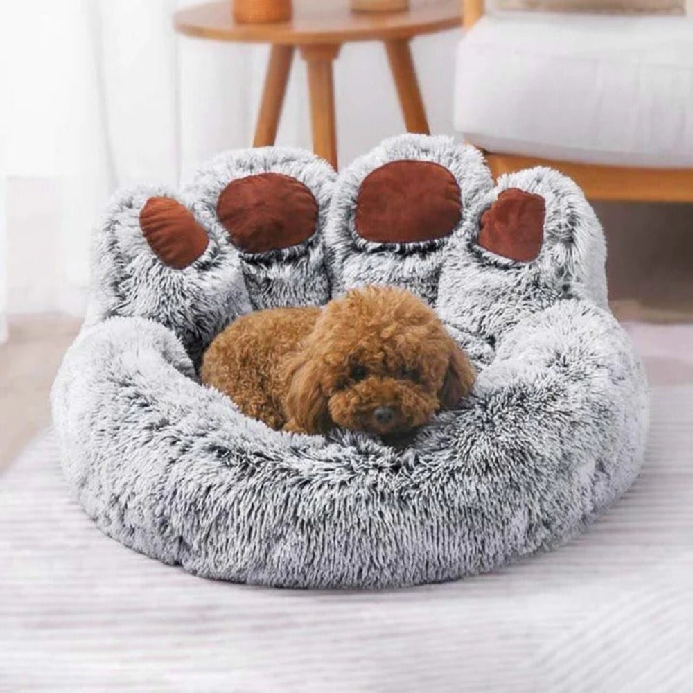 Brown calming pet sofa bed with raised rim, anti-anxiety design, and washable cover for dog comfort.
