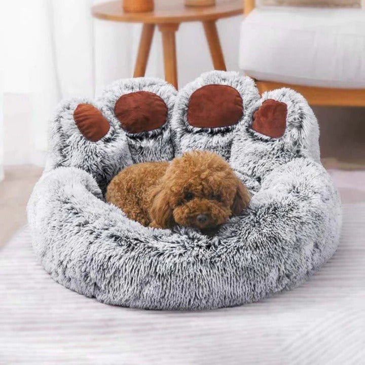 Brown calming pet sofa bed with raised rim, anti-anxiety design, and washable cover for dog comfort.