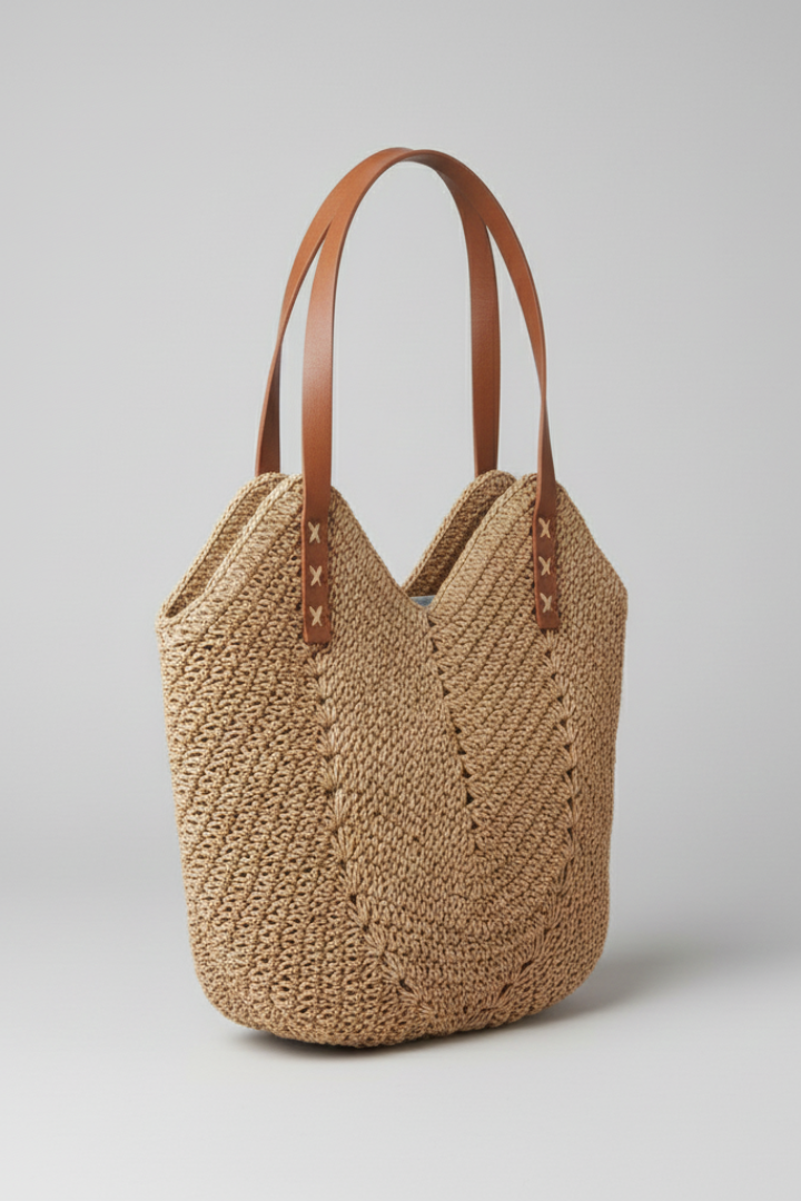 Stylish women's textured shoulder bag in brown, with long handles, perfect as a versatile everyday fashion statement.