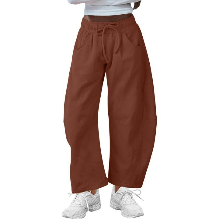 Comfortable barrel-leg women's trousers, versatile for casual or dressed-up modern styles.