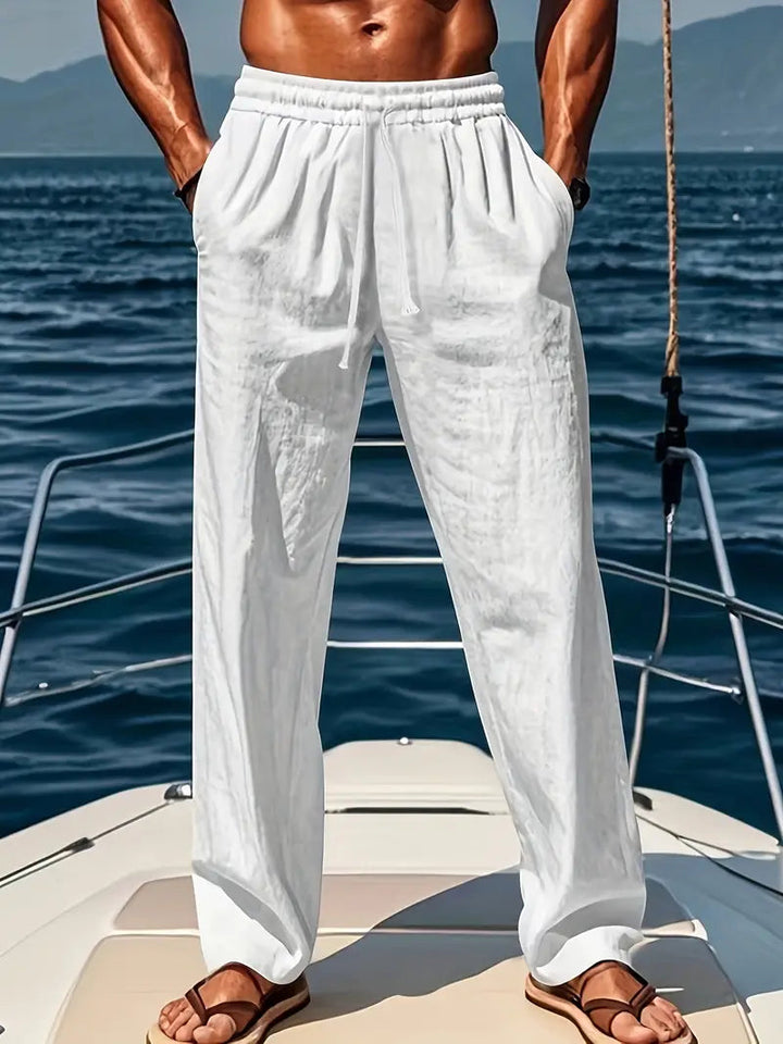 Men's loose fit casual pants with drawstring waist for comfort and relaxed everyday style.