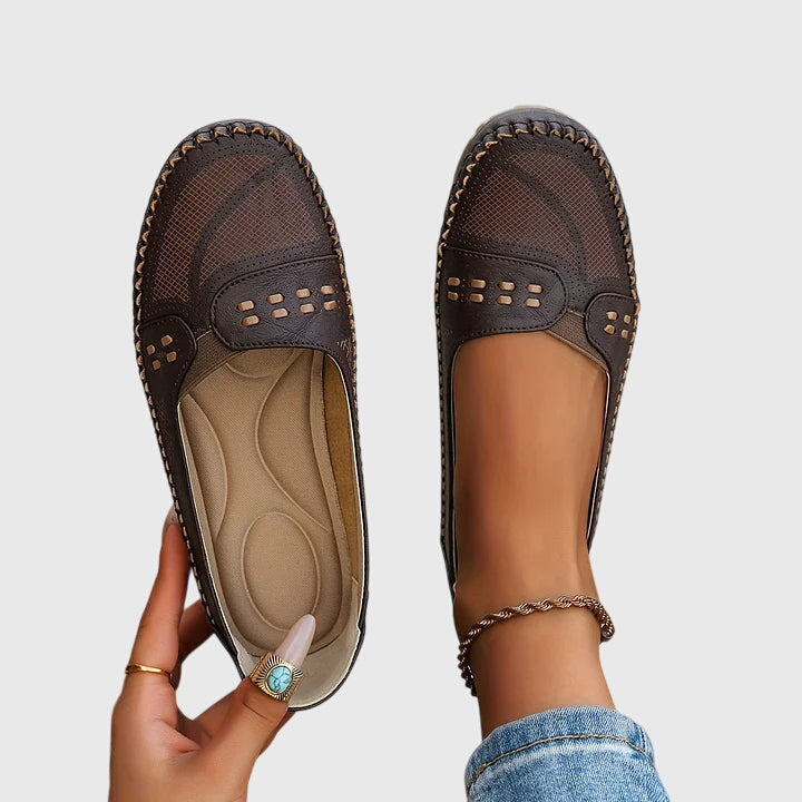 Comfortable women's slip-on orthopedic shoes, lightweight design for foot support & easy wear.