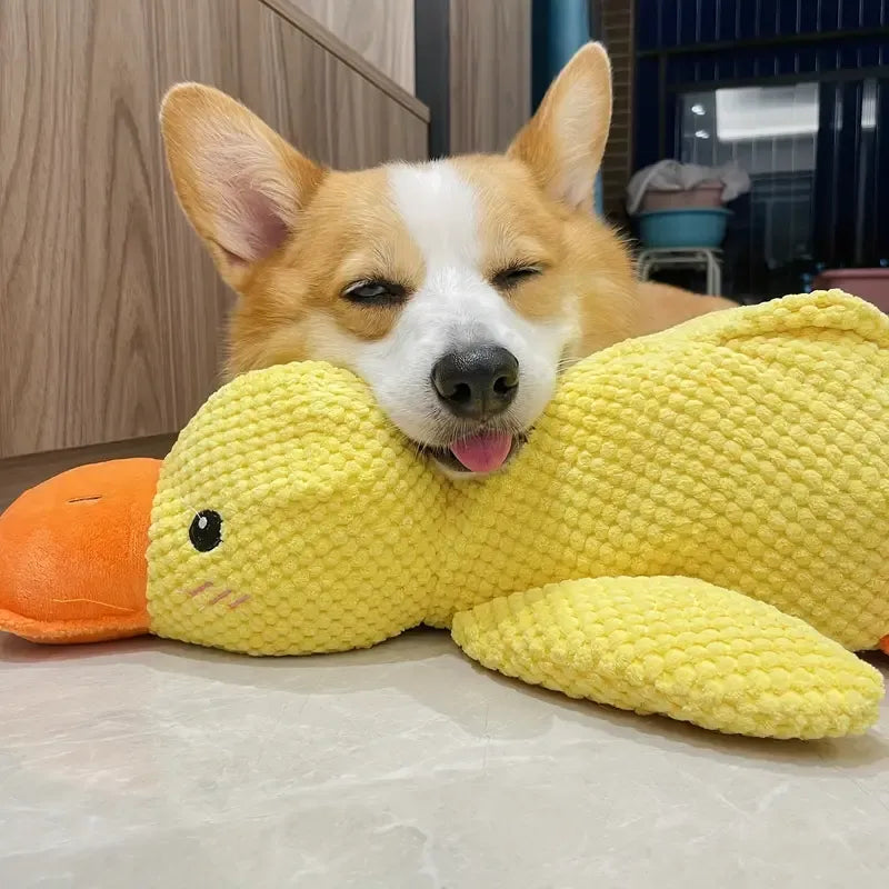 Calming duck plush dog toy with deep quack, soft fabric for anxious dogs & puppies to cuddle & chew